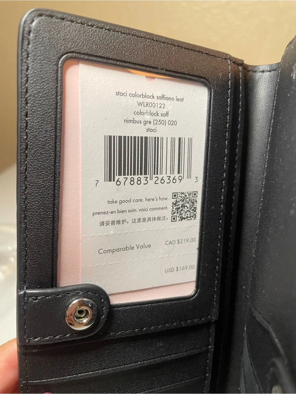 kate spade Two-Tone White and Light Gray Saffiano Zip Wallet with Gold Logo